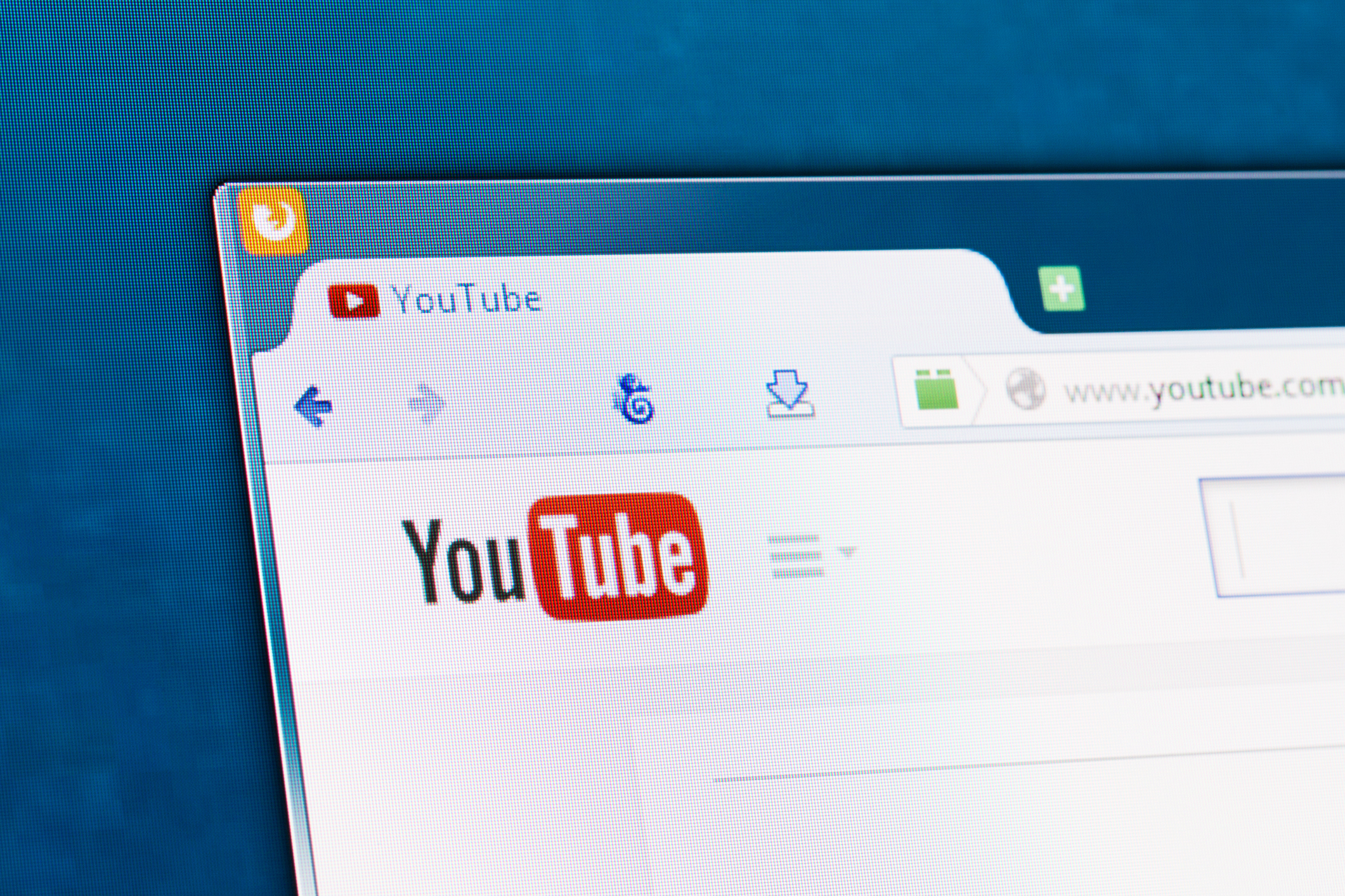 Photo of Youtube social network homepage on a monitor screen.